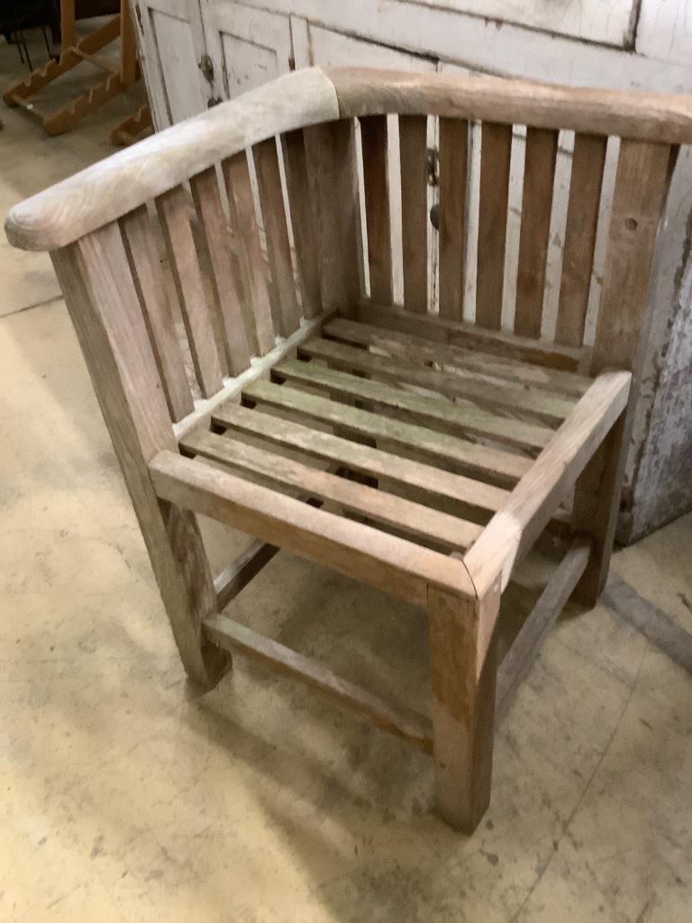 A Heals type weathered square teak garden table, 90cm, height 72cm and four chairs